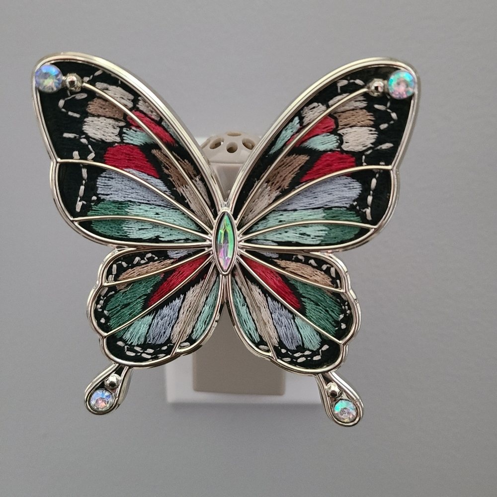Used BBW butterfly Wallflower fragrance plug-in.